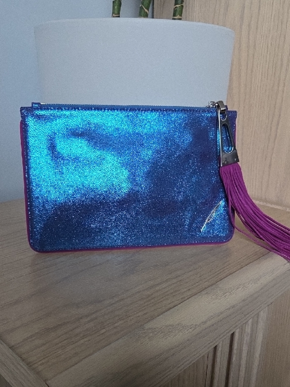 NWOT Brian Atwood Metallic Blue Leather Wristlet Clutch with Purple Tassel